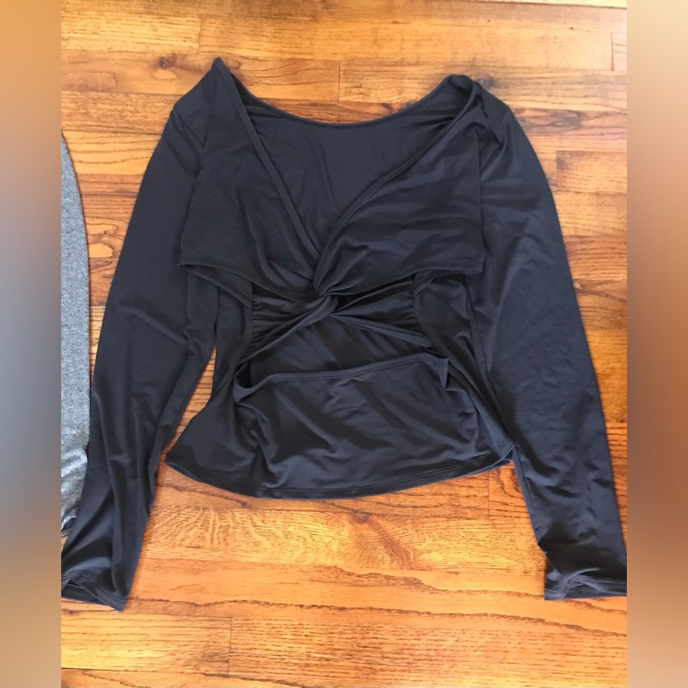 Ladies Girls Athletic Dri-fit Activewear Tops
Black open back twisted knots - Picture 7 of 16